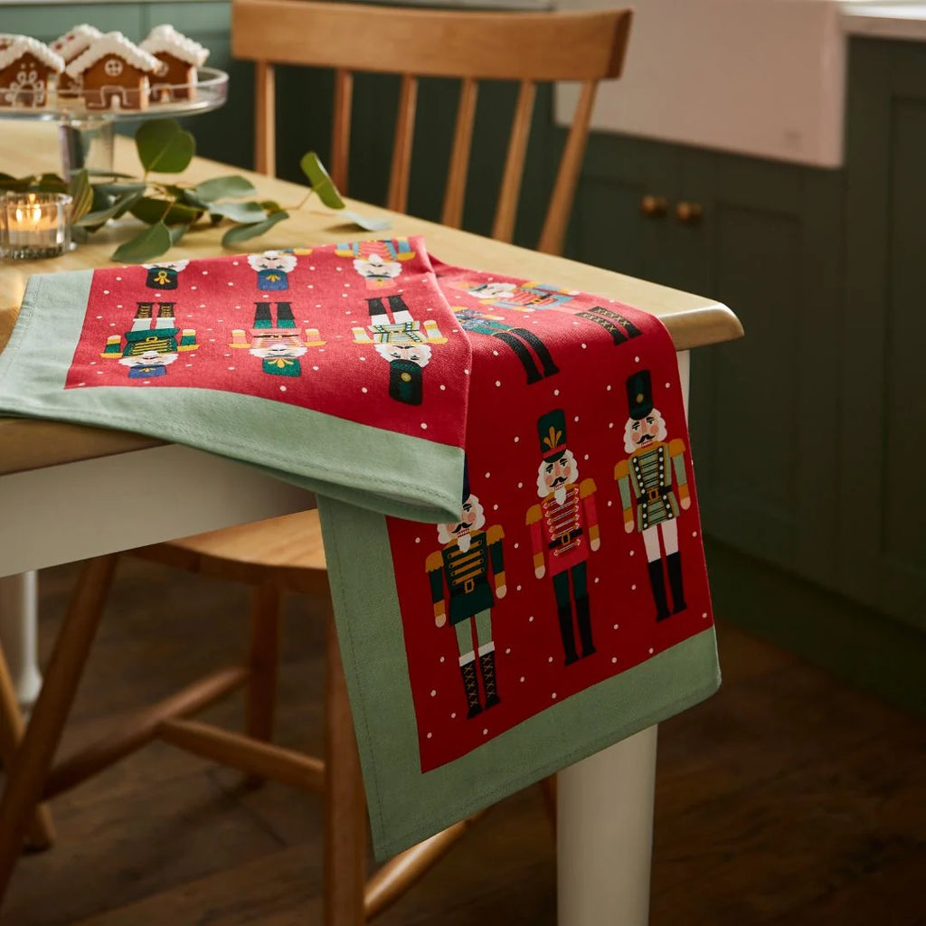Ulster Weavers Nutcracker Parade Recycled Cotton Tea Towel in Red