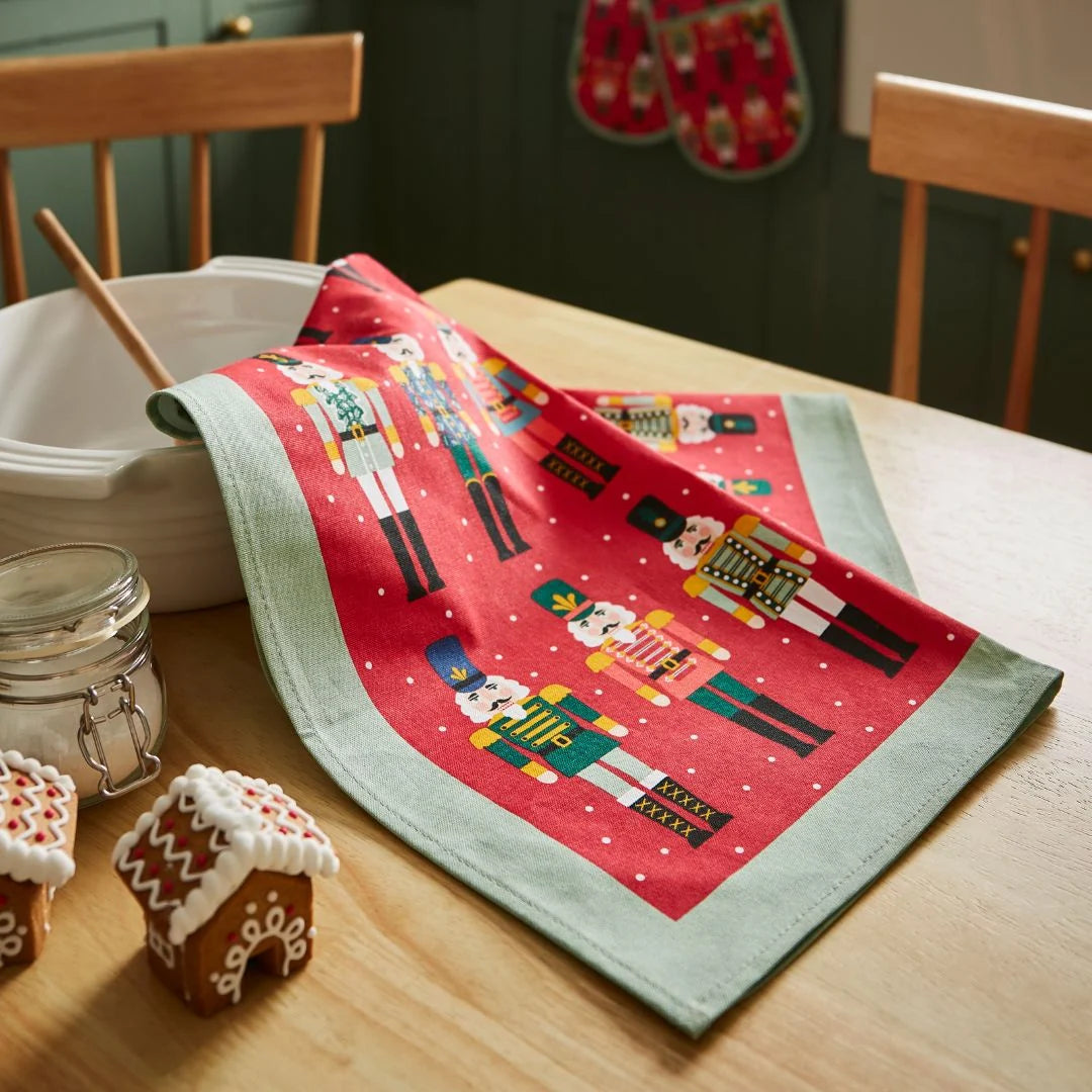 Ulster Weavers Nutcracker Parade Recycled Cotton Tea Towel in Red