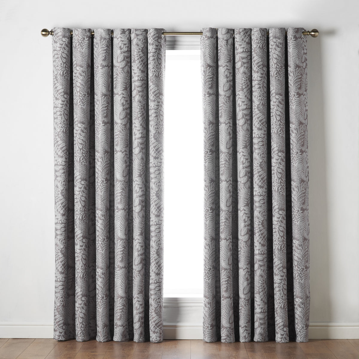 Ferndown Botanical Blackout Eyelet Curtains in Latte