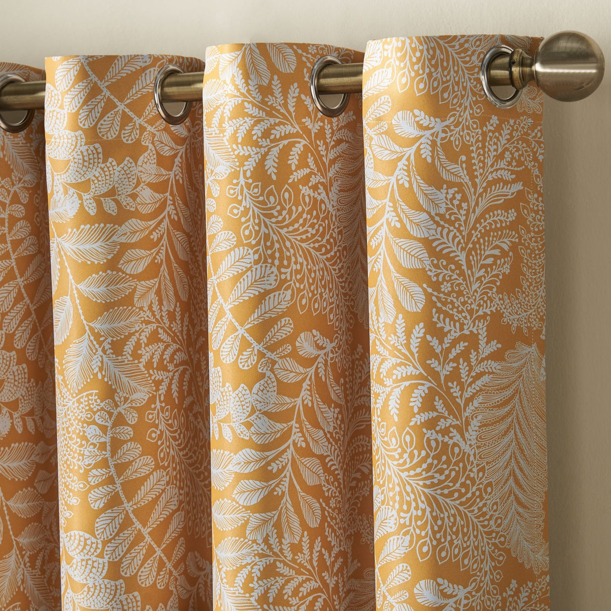Ferndown Botanical Blackout Eyelet Curtains in Ochre
