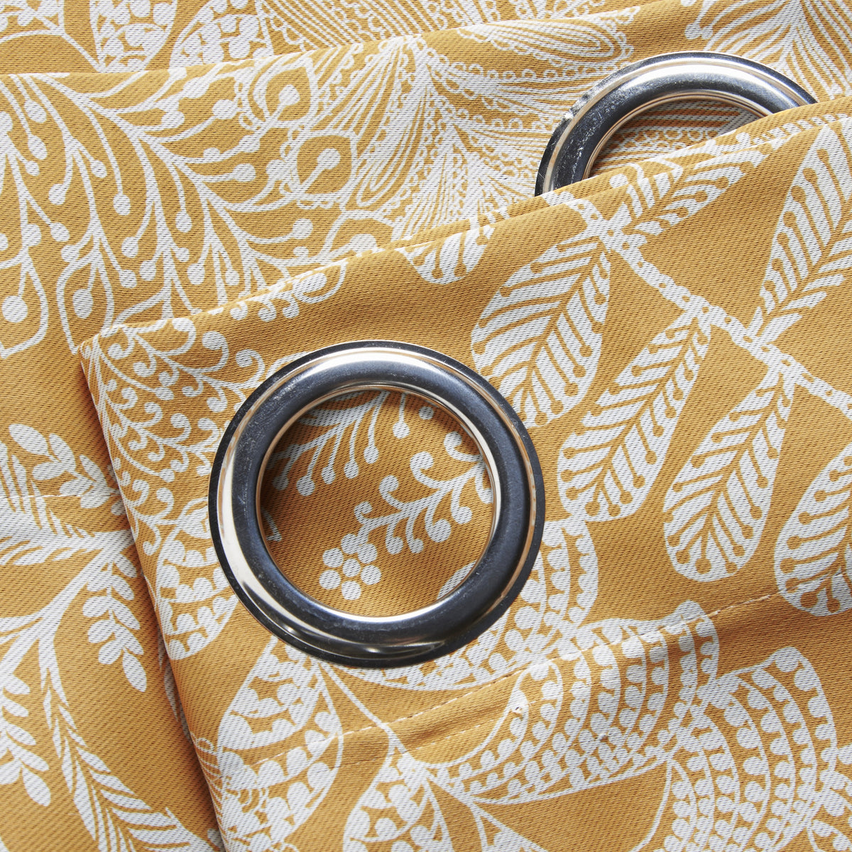 Ferndown Botanical Blackout Eyelet Curtains in Ochre