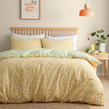Fusion Retro Daisy Floral reversible polycotton duvet cover set in yellow.