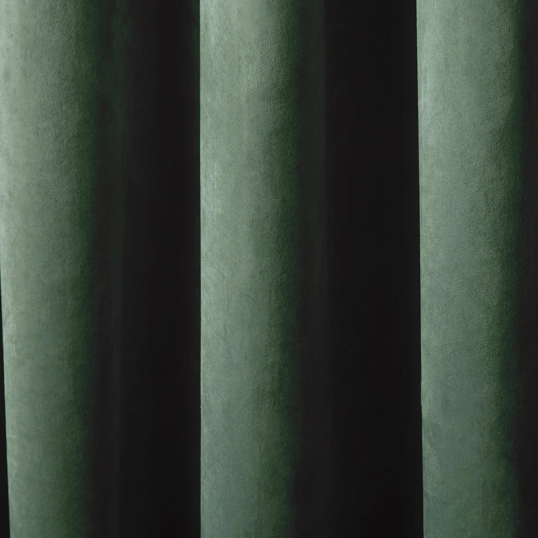 Laurence Llewelyn-Bowen Montrose Blackout Velvet Eyelet Curtains in Bottle Green