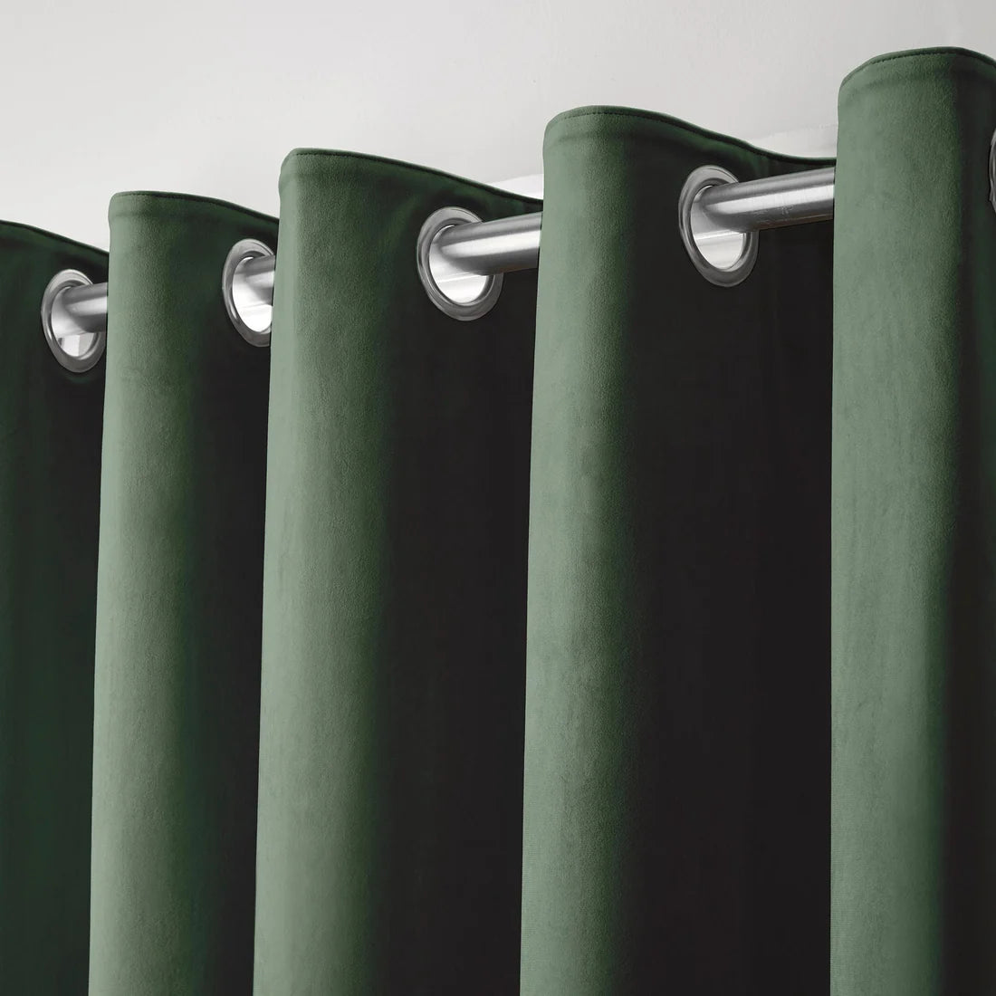 Laurence Llewelyn-Bowen Montrose Blackout Velvet Eyelet Curtains in Bottle Green
