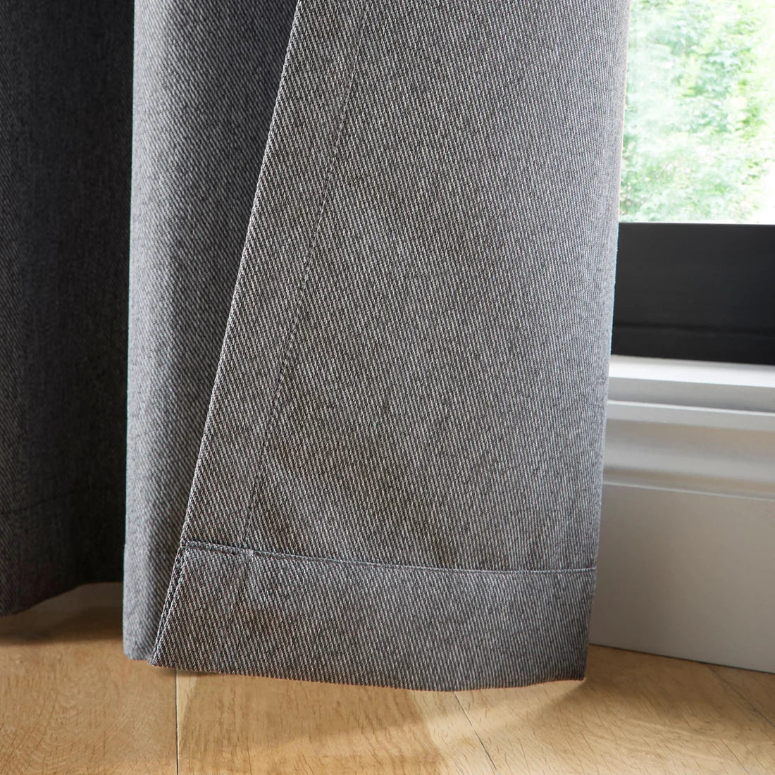 Curtina Plain Twill Blackout Eyelet Curtains in Charcoal