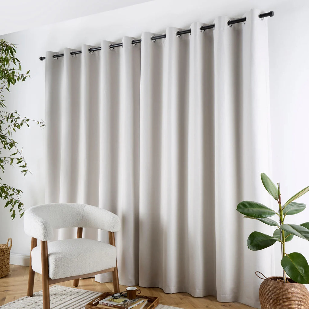 Curtina Plain Twill Blackout Eyelet Curtains in Natural