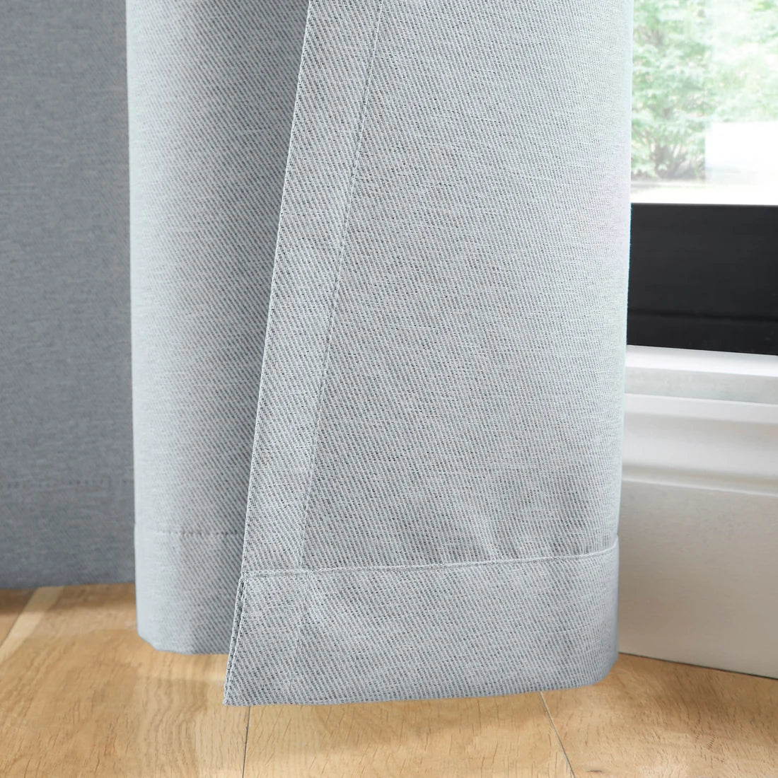 Curtina Plain Twill Blackout Eyelet Curtains in Silver