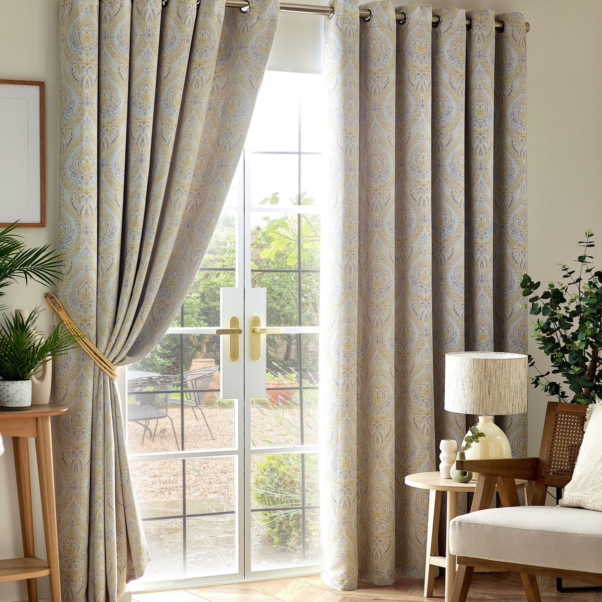Victoria Blackout Eyelet Curtains in Ochre