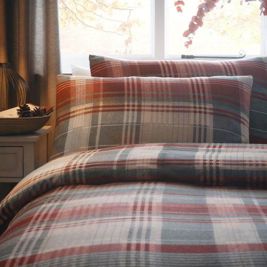 Close-up of the country check pattern and woodland stag design on the Appletree Connolly duvet cover set.