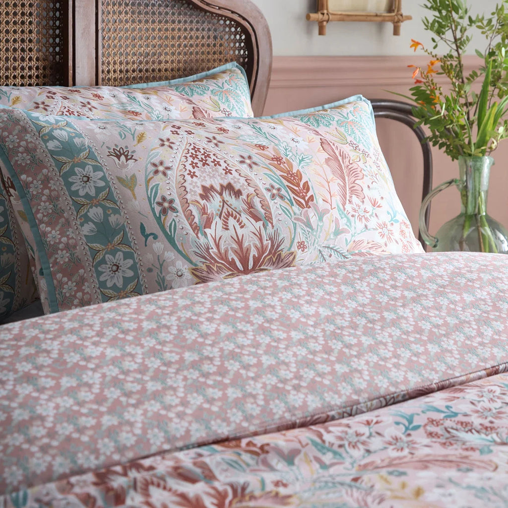Close-up of the ornamental floral damask pattern on the Appletree Floral Damask duvet cover set.