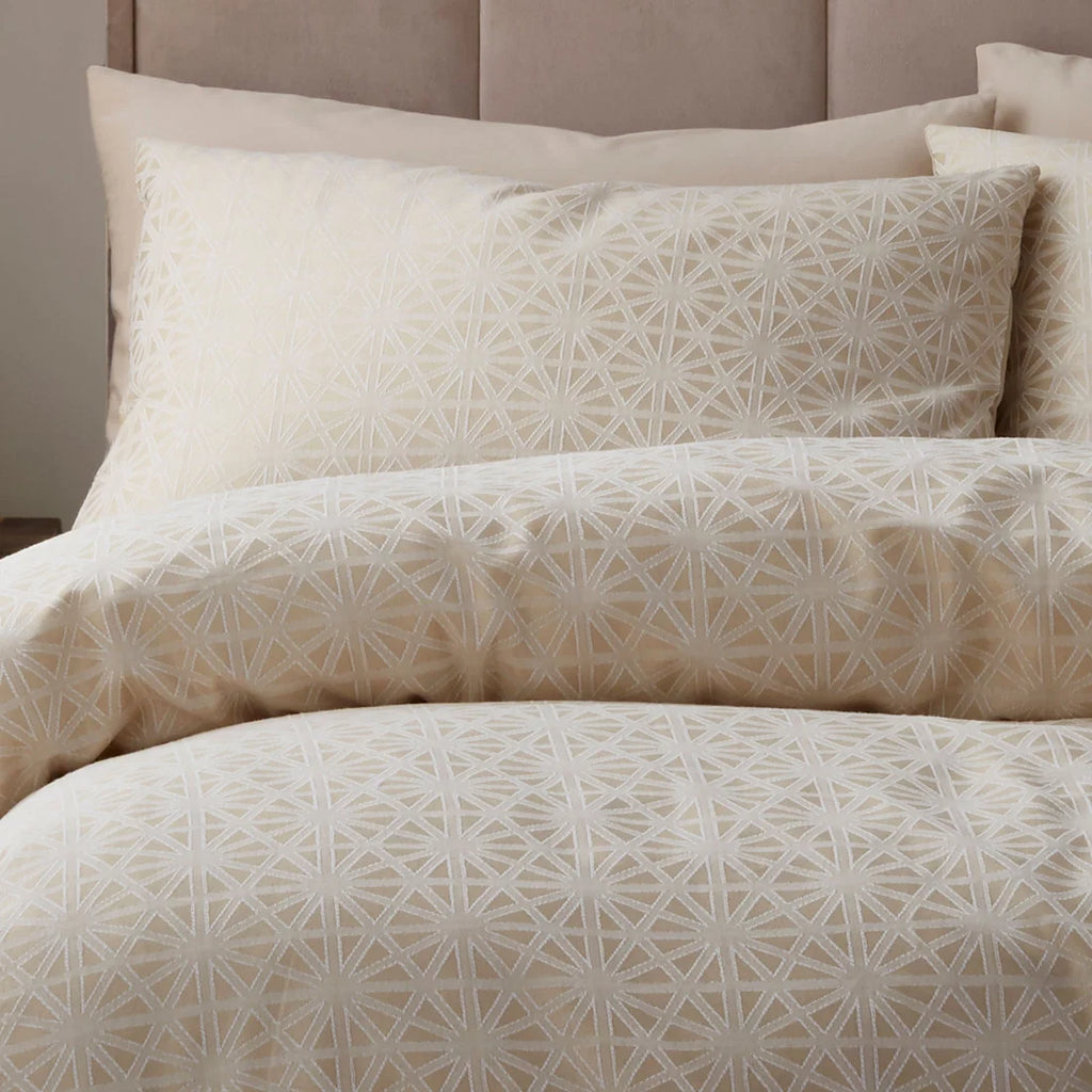 Close-up of the woven geometric jacquard pattern on the Appletree Geo Jacquard duvet cover set.