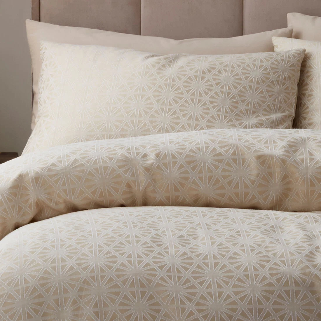 Close-up of the woven geometric jacquard pattern on the Appletree Geo Jacquard duvet cover set.