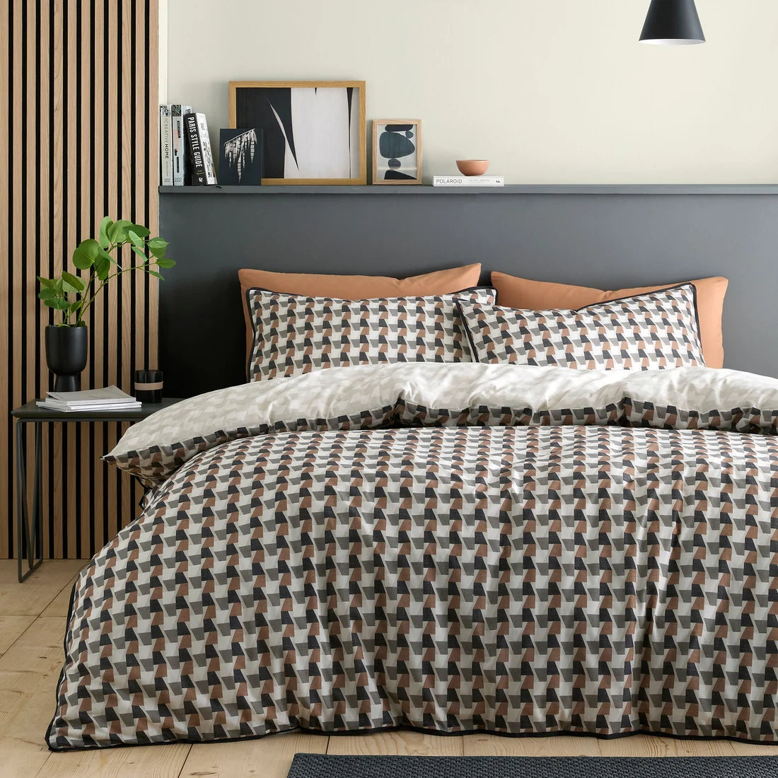 Appletree Jett reversible cotton duvet cover set in brown and bracken with geometric design.