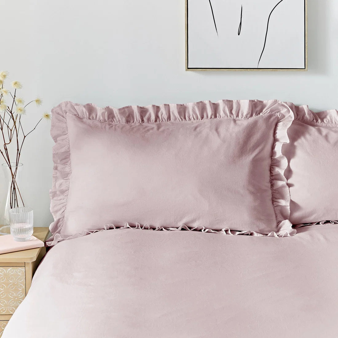 Close-up of the decorative frilled edging on the Appletree Loft Cassia Frill duvet cover set.