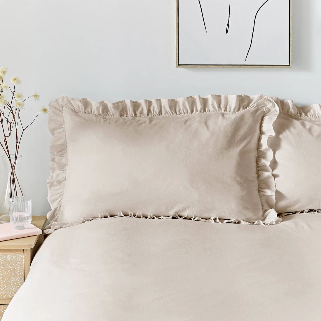 Close-up of the decorative frilled edging on the Appletree Loft Cassia Frill duvet cover set.