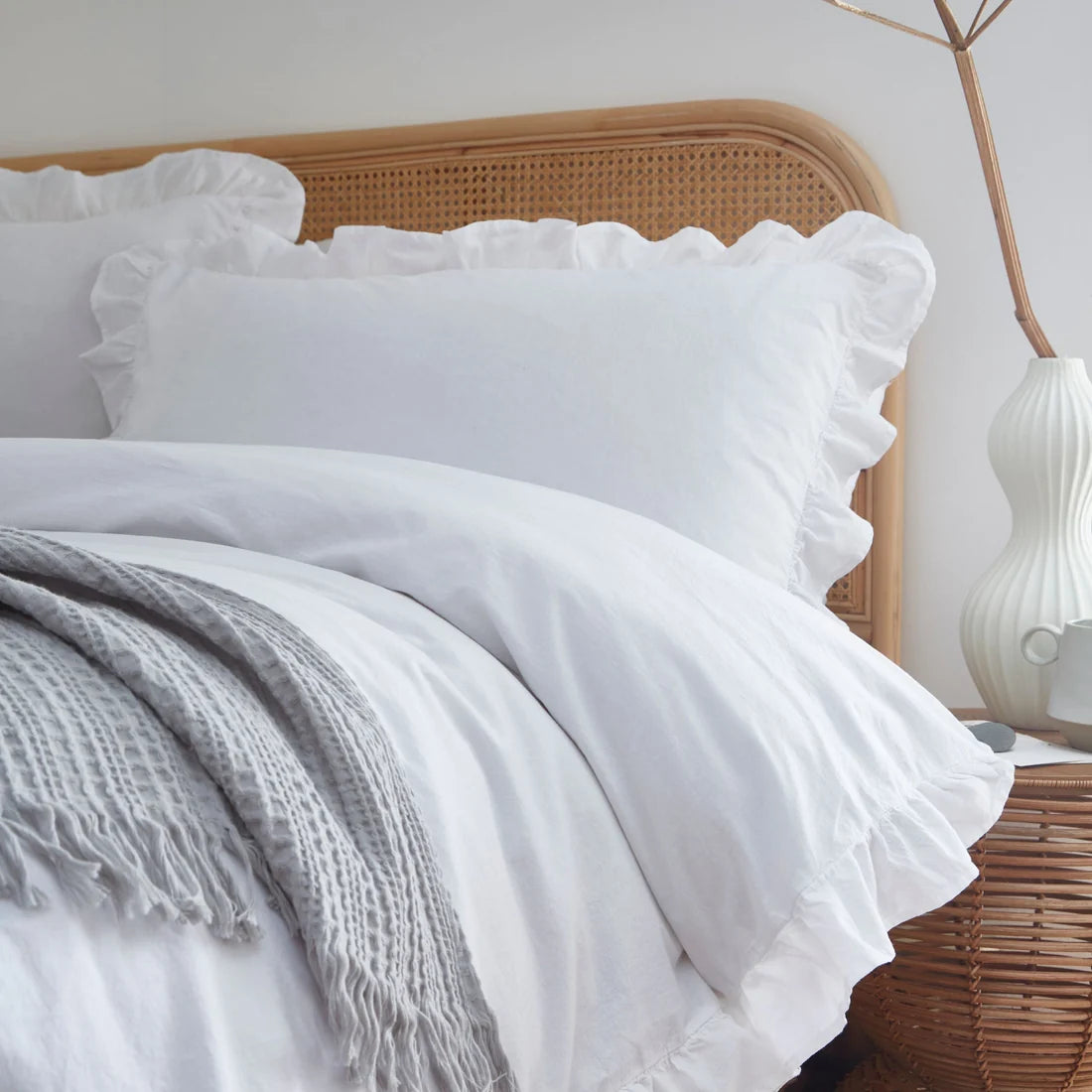 Close-up of the decorative frilled edging on the Appletree Loft Cassia Frill duvet cover set.