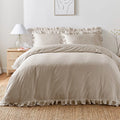 Appletree Loft Cassia Frill 100% cotton duvet cover set in natural.