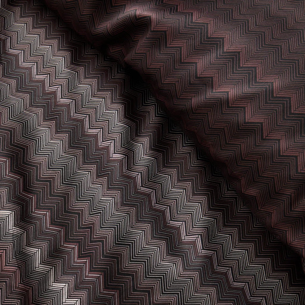 Close-up of the smooth cotton sateen fabric on the Appletree Loft Chevron Stripe Chocolate duvet set.