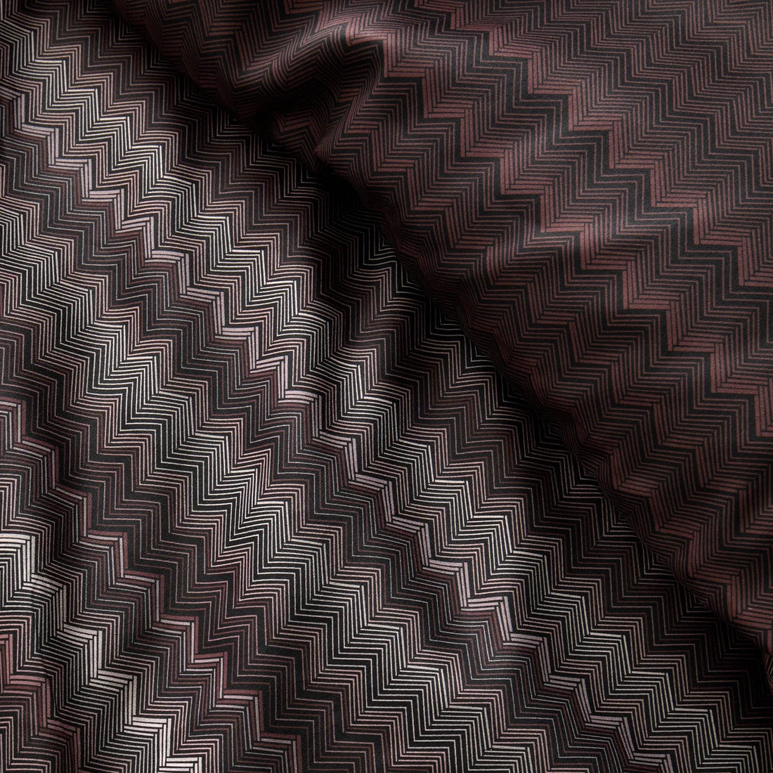 Close-up of the smooth cotton sateen fabric on the Appletree Loft Chevron Stripe Chocolate duvet set.