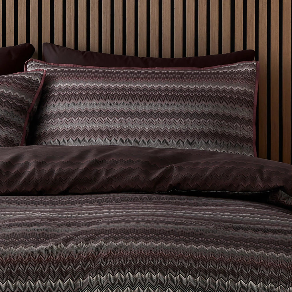 Close-up of the fine chevron pattern on the Appletree Loft Chevron Stripe Chocolate bedding.
