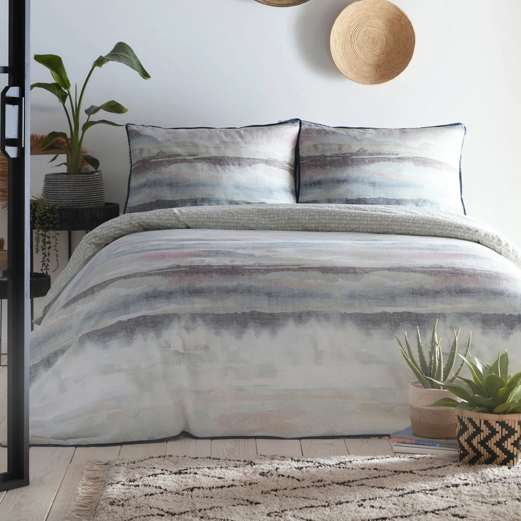 Appletree Loft Landscape reversible 100% cotton duvet cover set in seafoam with watercolour design.
