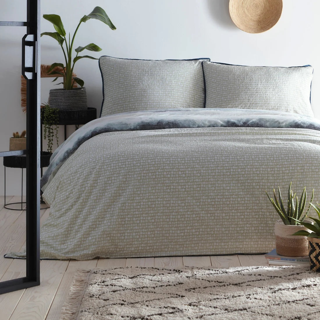 Reverse design on the Appletree Loft Landscape Seafoam duvet cover set.