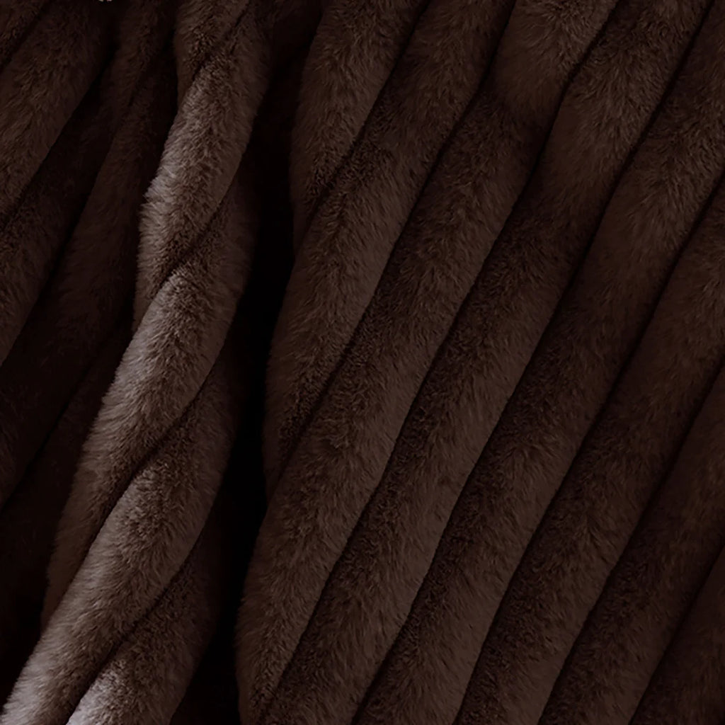 Close-up of the ribbed texture on the Appletree Morritz Chocolate faux fur bedspread.