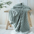 Appletree Morritz ribbed throw in green measuring 130 x 180cm.