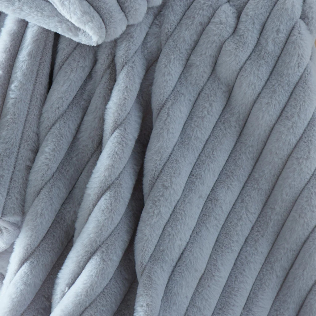 Close-up of the ribbed texture on the Appletree Morritz grey throw.