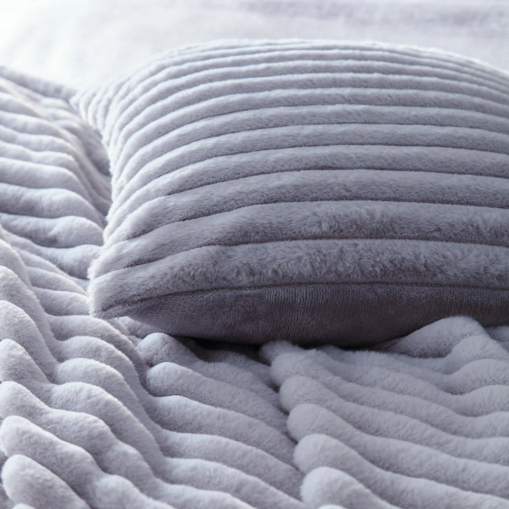 Close-up of the soft polyester fabric on the Appletree Morritz grey throw.