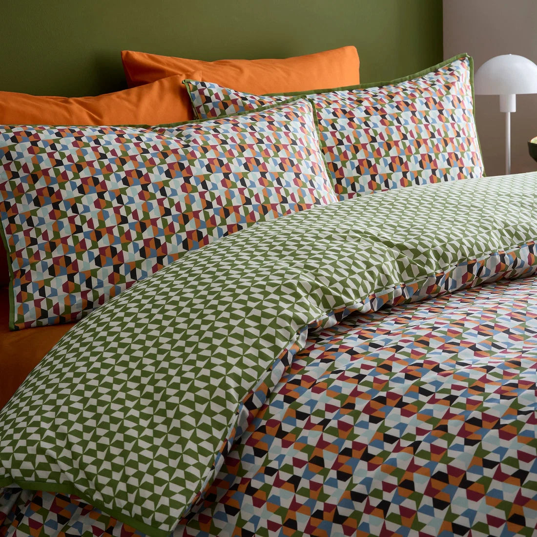 Close-up of the retro geometric tile pattern on the Appletree Star Geo duvet cover set.