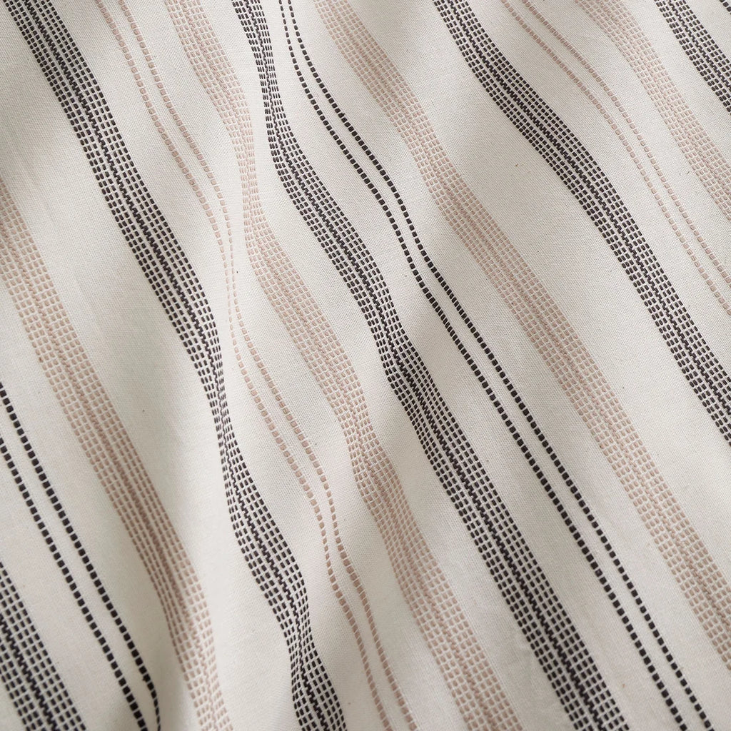 Close-up of the soft 100% cotton yarn-dyed woven fabric on the Appletree Thin Stripe duvet cover set.
