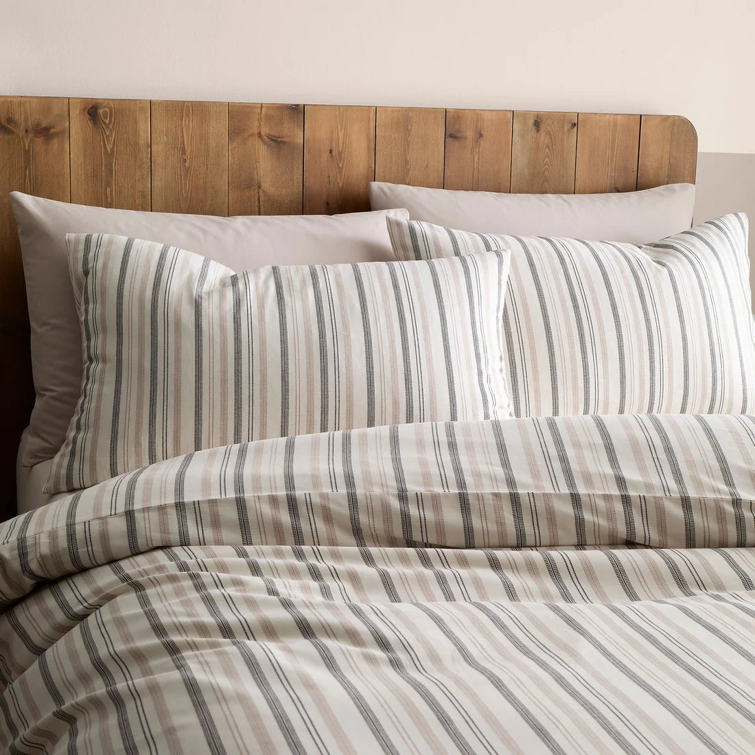 Close-up of the woven thin stripe design on the Appletree Yarn Dyed Woven duvet cover set.