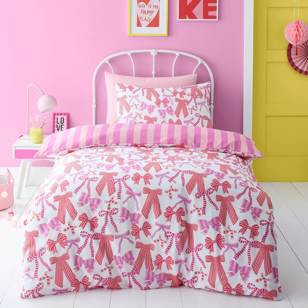 Bedlam Bow and Stripes reversible duvet cover set in pink with a playful bow design.