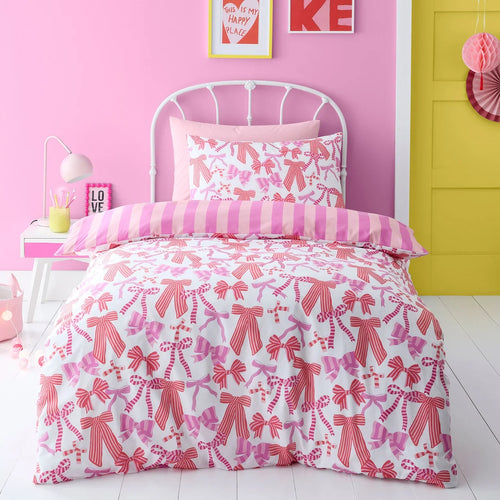 Bedlam Bow and Stripes reversible duvet cover set in pink with a playful bow design.