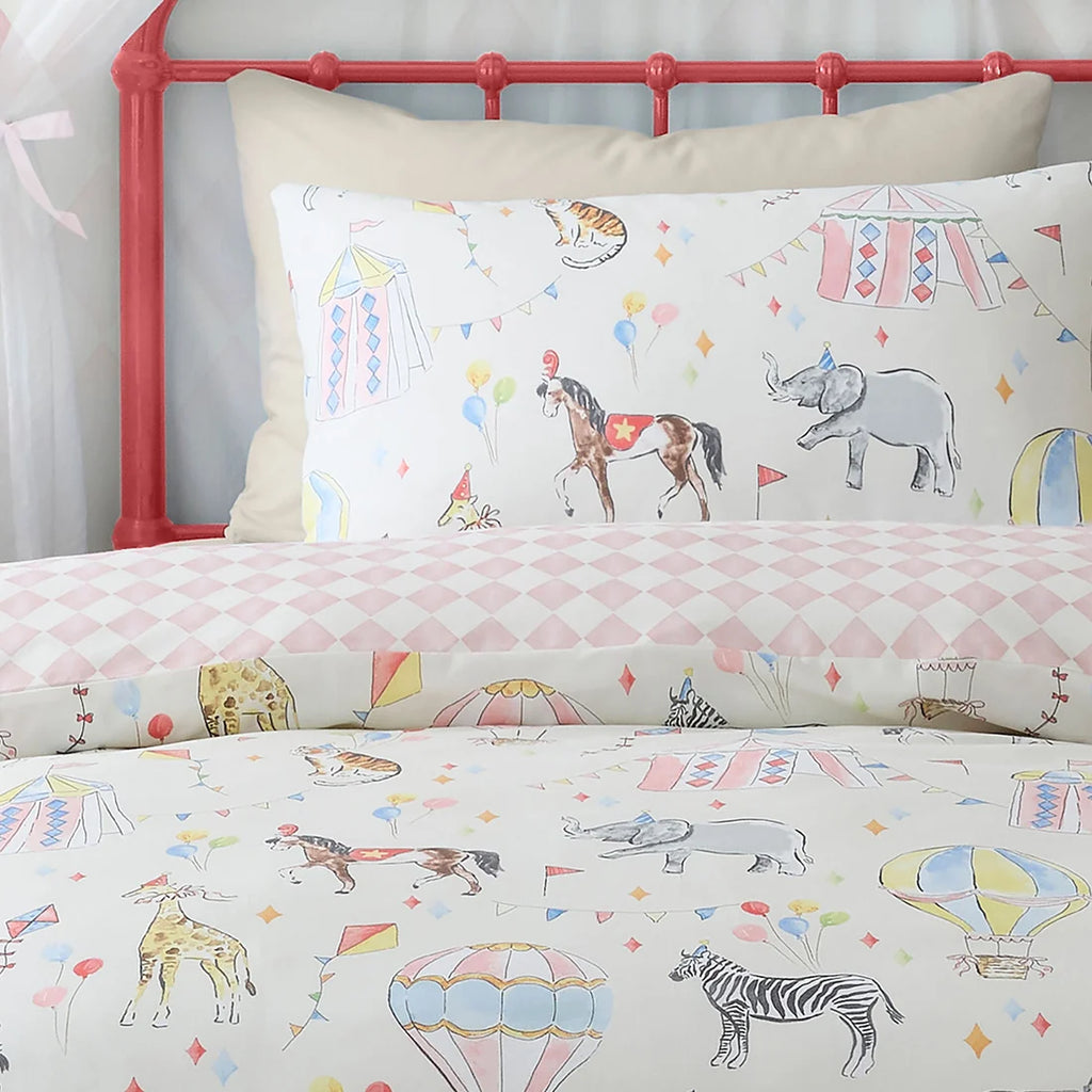Close-up of the colourful circus characters on the Bedlam Circus Time duvet cover set.