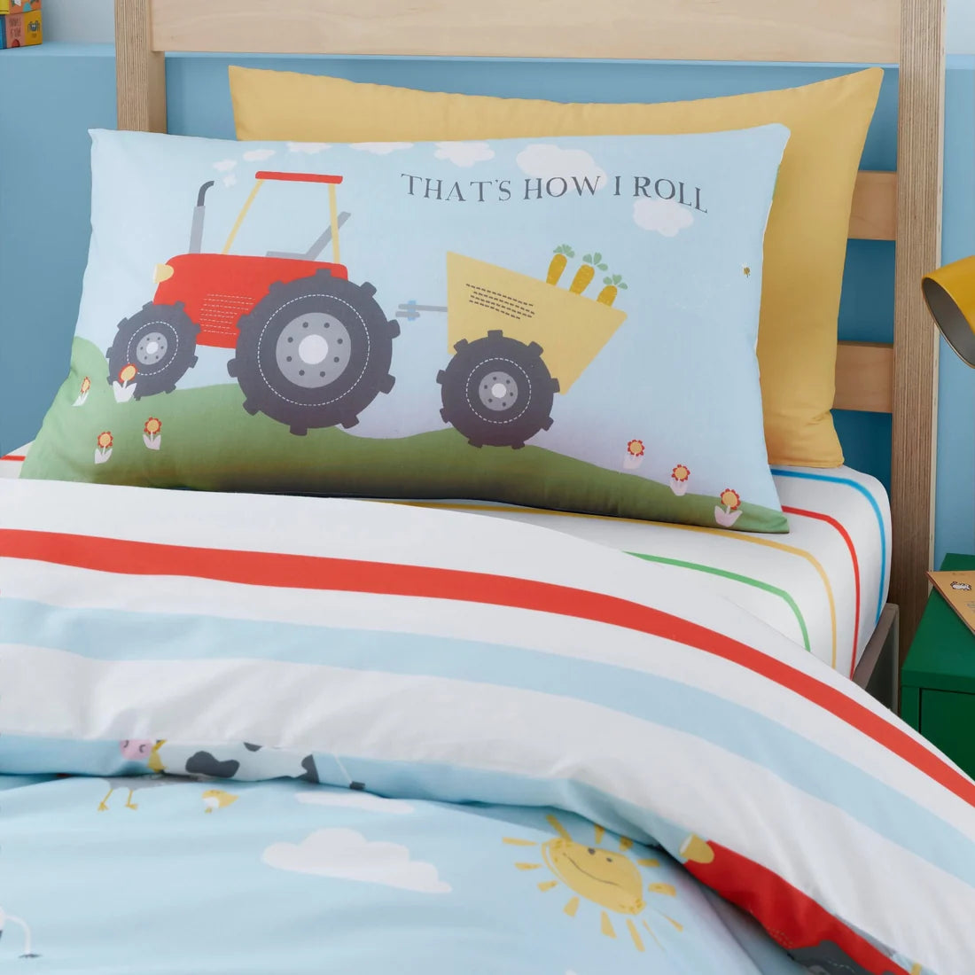 Close-up of the farm animals and tractor design on the Bedlam Farmyard Friends duvet cover set.