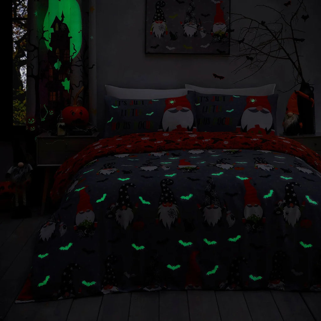 Close-up of the glow in the dark Halloween gonk design on the Bedlam Scary Gonks duvet cover set.