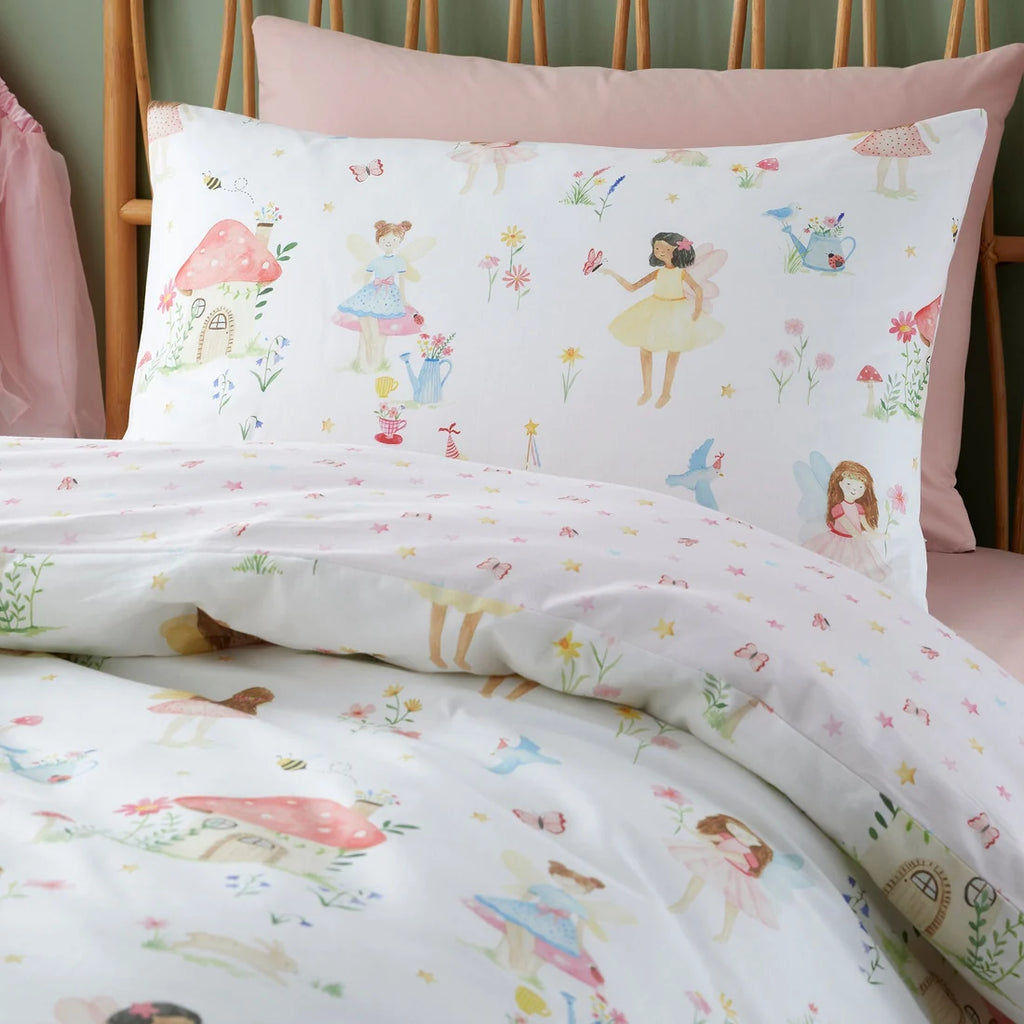 Close-up of the fairy, flower and mushroom house design on the Bedlam Summer Fairies duvet cover set.
