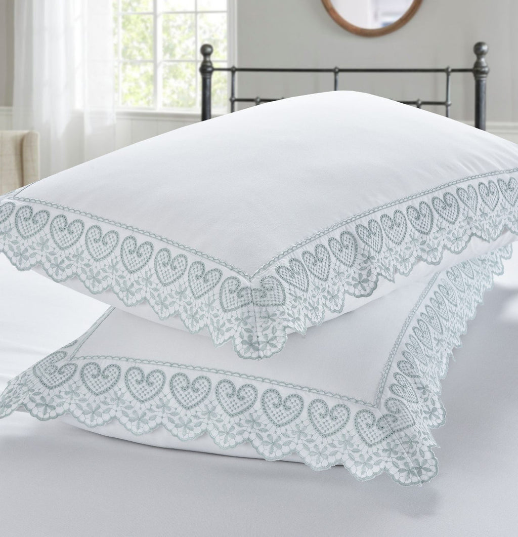 Belle Maison Elise embroidered pillowcases with elegant heart embroidery and lace edging.