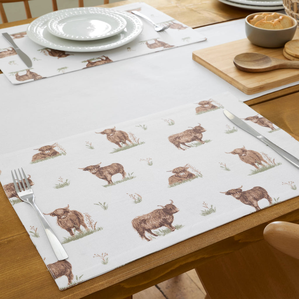 Catherine Lansfield Angus Highland Cow Cotton Dining Placemats 4 Pack in Natural