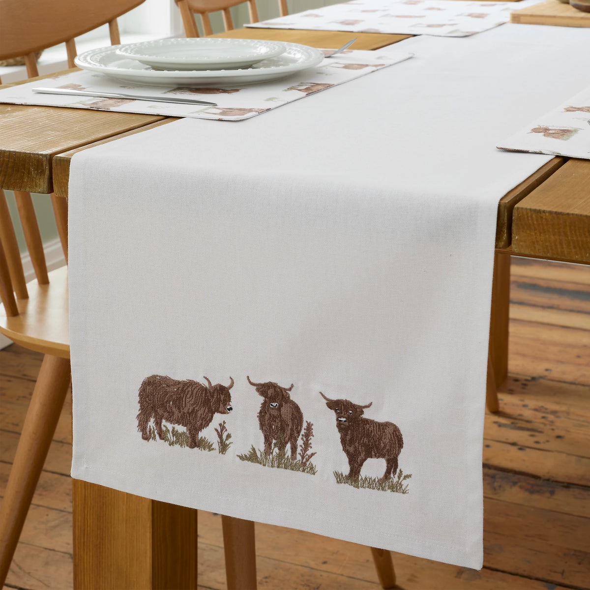 Catherine Lansfield Angus Highland Cow Cotton Dining Table Runner in Natural
