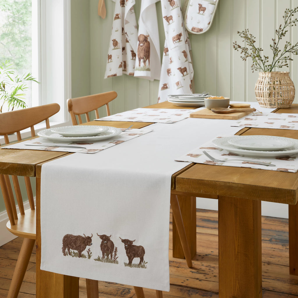 Catherine Lansfield Angus Highland Cow Cotton Dining Table Runner in Natural