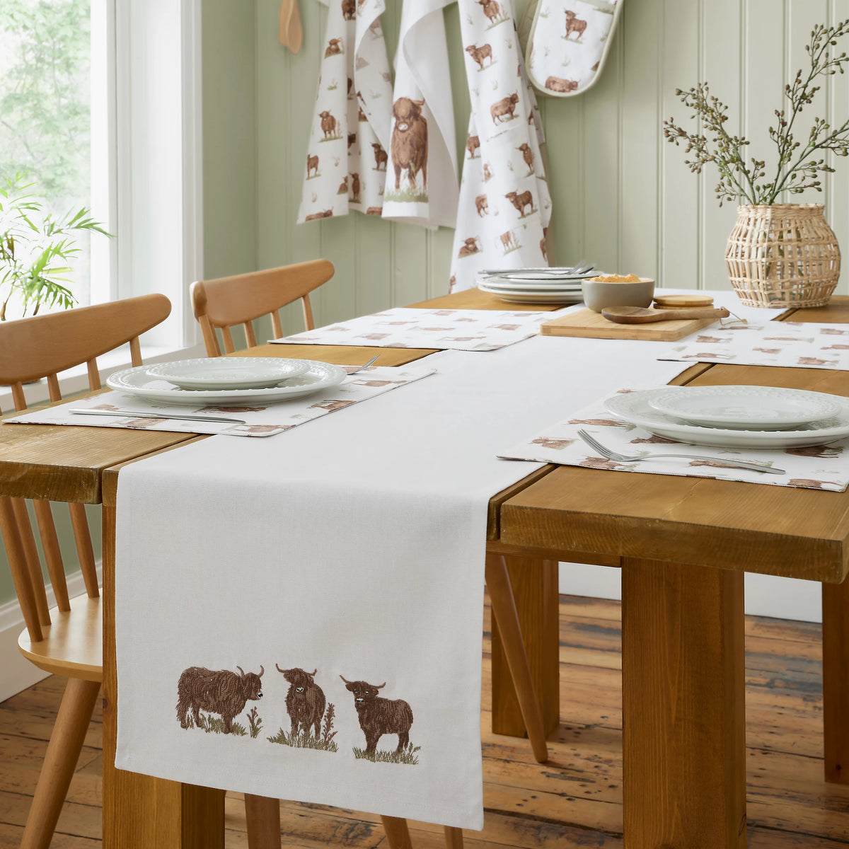 Catherine Lansfield Angus Highland Cow Cotton Dining Table Runner in Natural