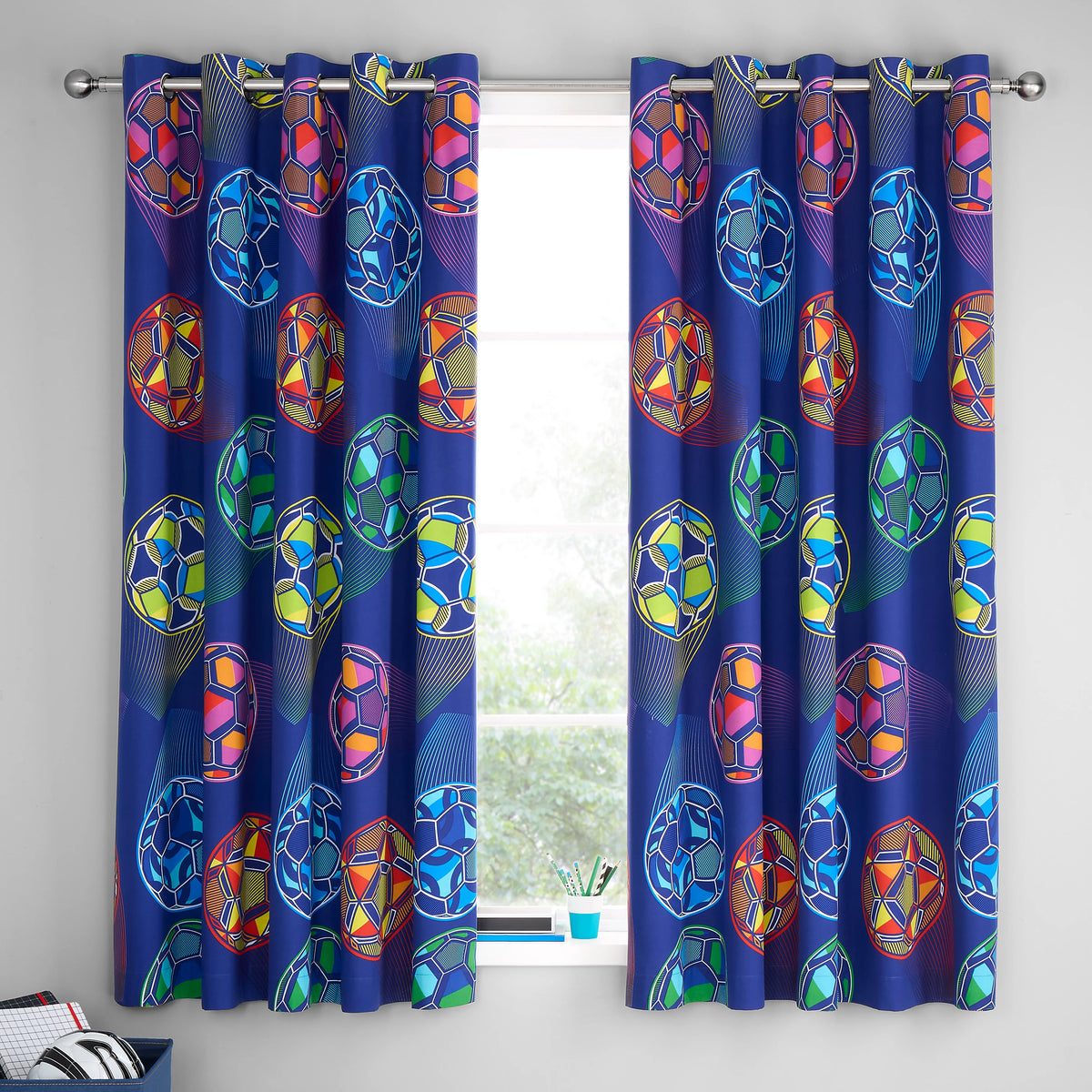 Catherine Lansfield Bright Football Fully Reversible Eyelet Curtains in Navy Blue 66 x 72 Inch