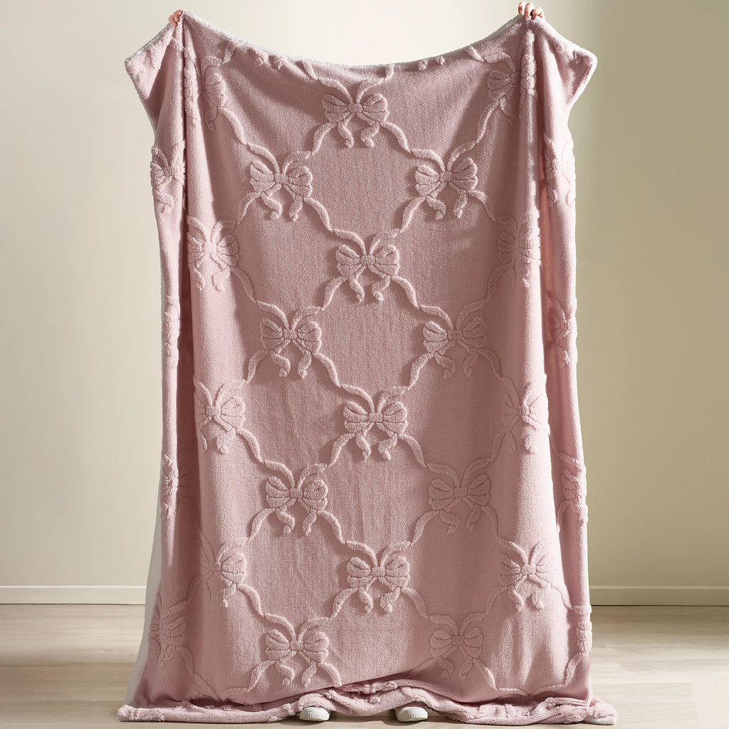 Catherine Lansfield Pink Carved Bow Cosy Fleece Blanket Throw