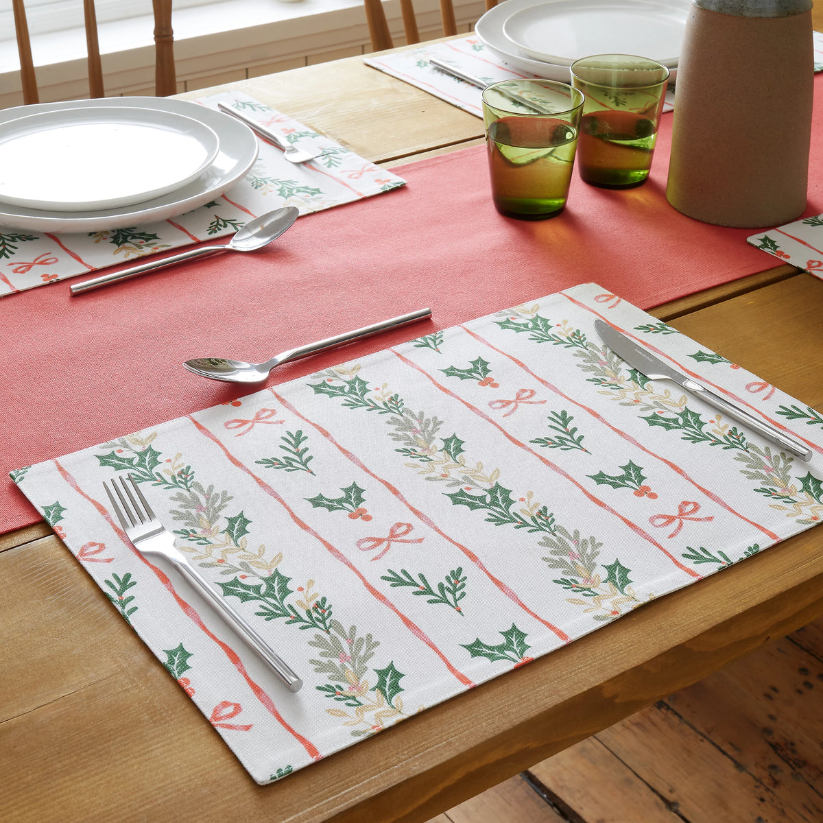 Catherine Lansfield Christmas Holly Stripe Cotton Placemats 4 Pack in Cream / Red
