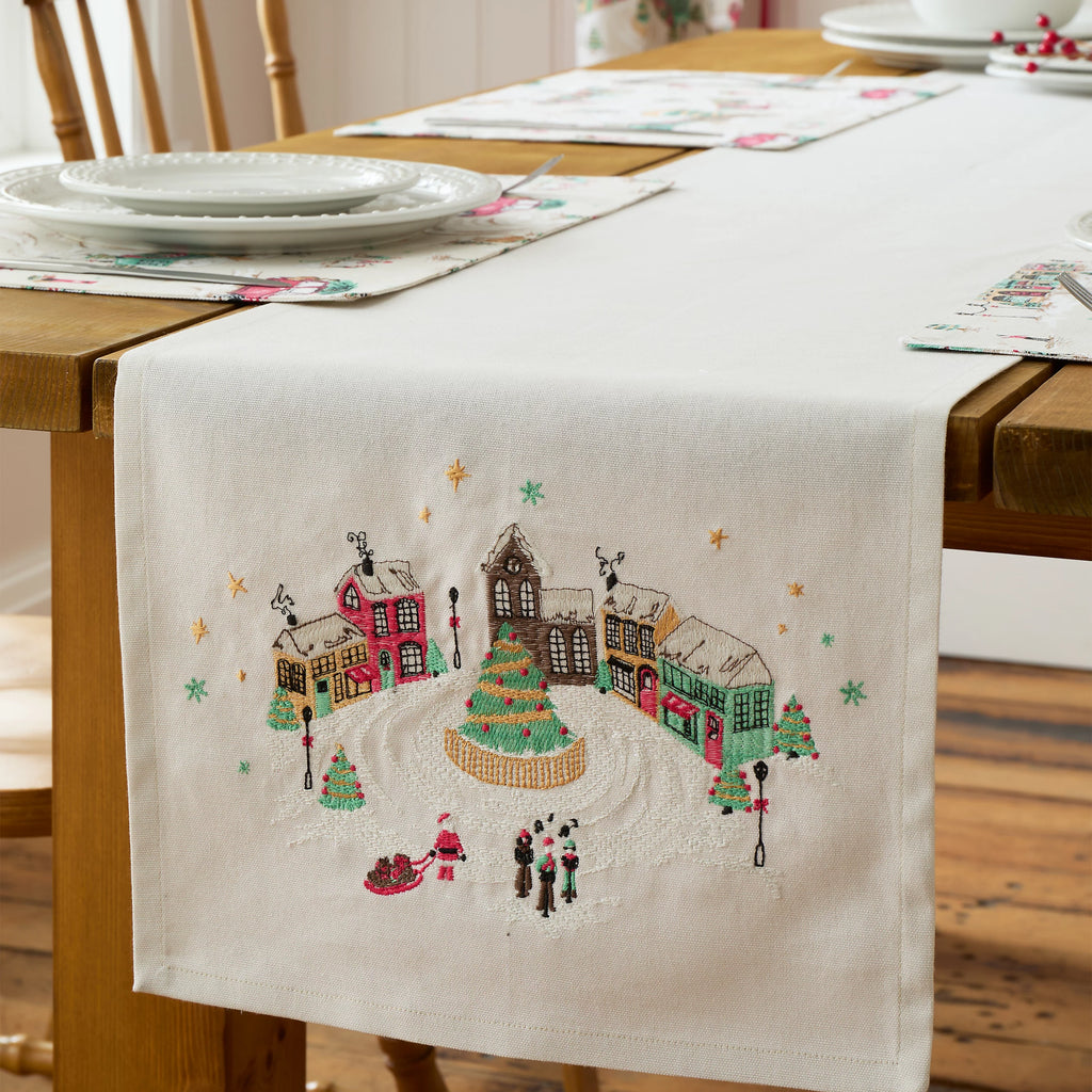 Catherine Lansfield Christmas Town Cotton Table Runner in Natural 33 x 220cm