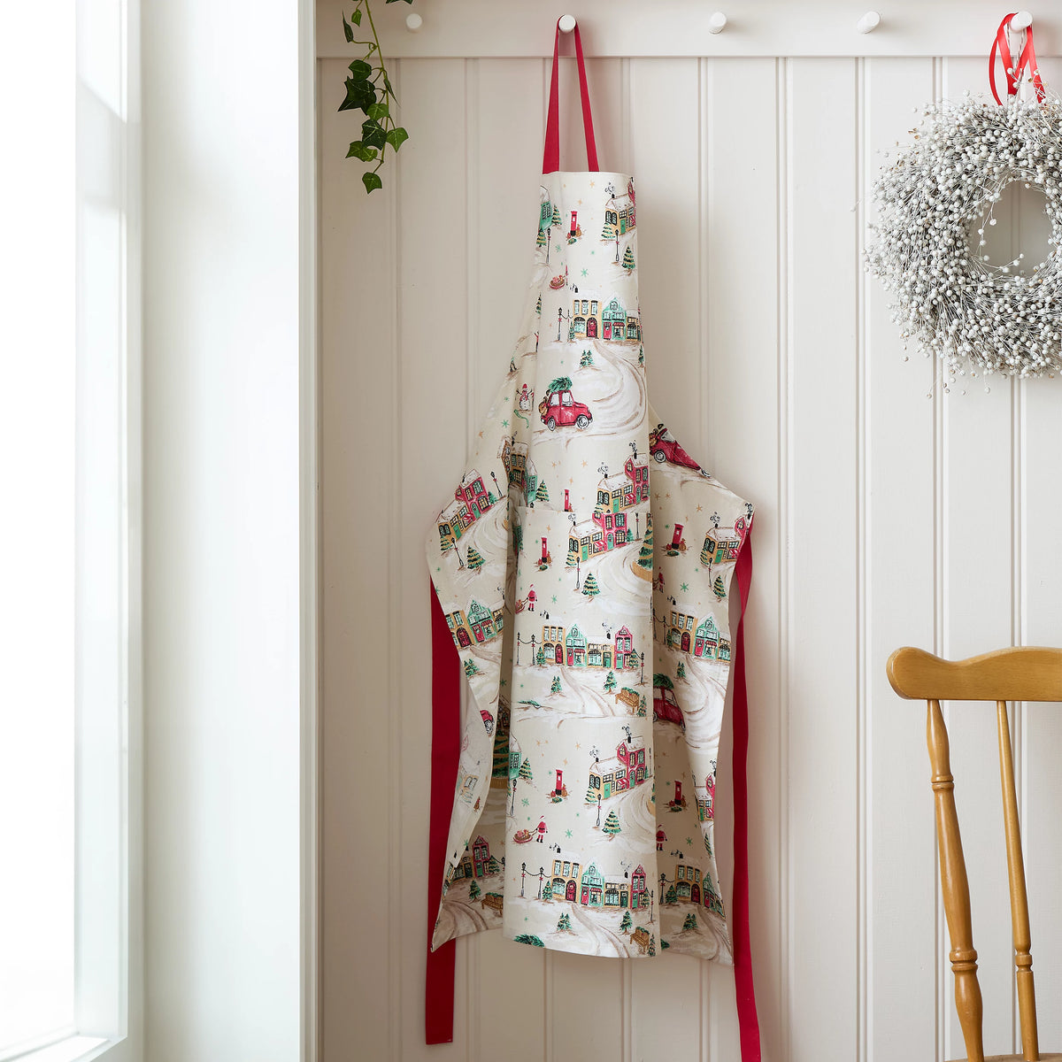 Catherine Lansfield Christmas Town Cotton Kitchen Apron in Natural