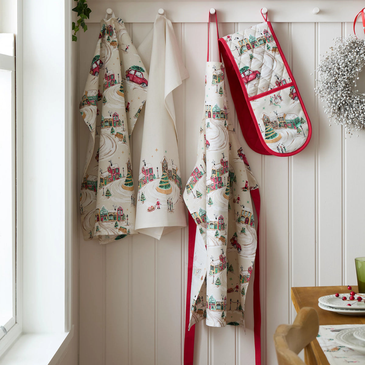 Catherine Lansfield Christmas Town Cotton Kitchen Apron in Natural